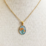 Pâquerette orange sur fond bleu